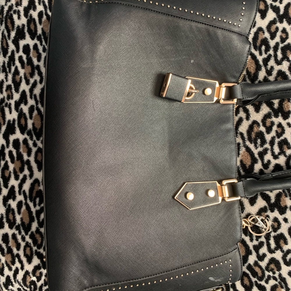 Miztique gorgeous black studded buckle satchel.😍